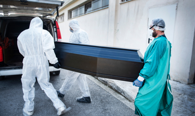 Funeral,Home,Employees,Wear,Protective,Suits,To,Protect,Themselves,From Funeral,Home,Employees,Wear,Protective,Suits,To,Protect,Themselves,From