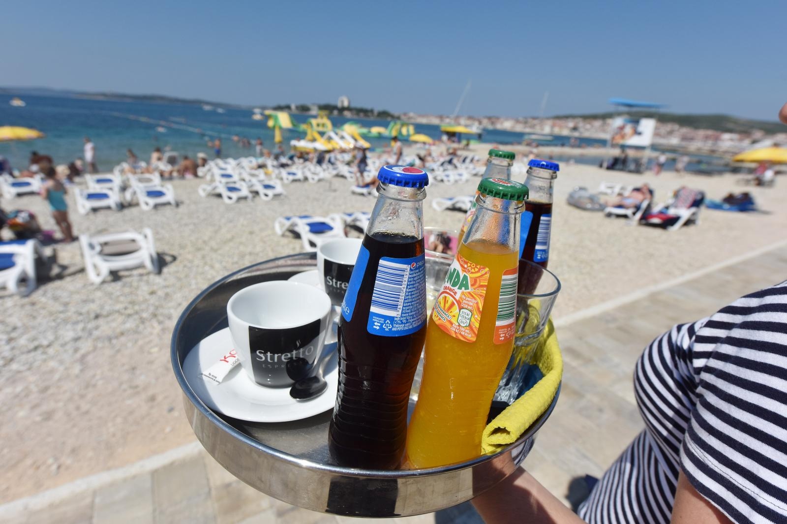 05.07.2018., Vodice – Konobar na plazi. Photo: Hrvoje Jelavic/PIXSELL