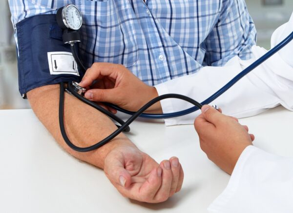 Doctor,Measuring,Blood,Pressure,With,Sphygmomanometer