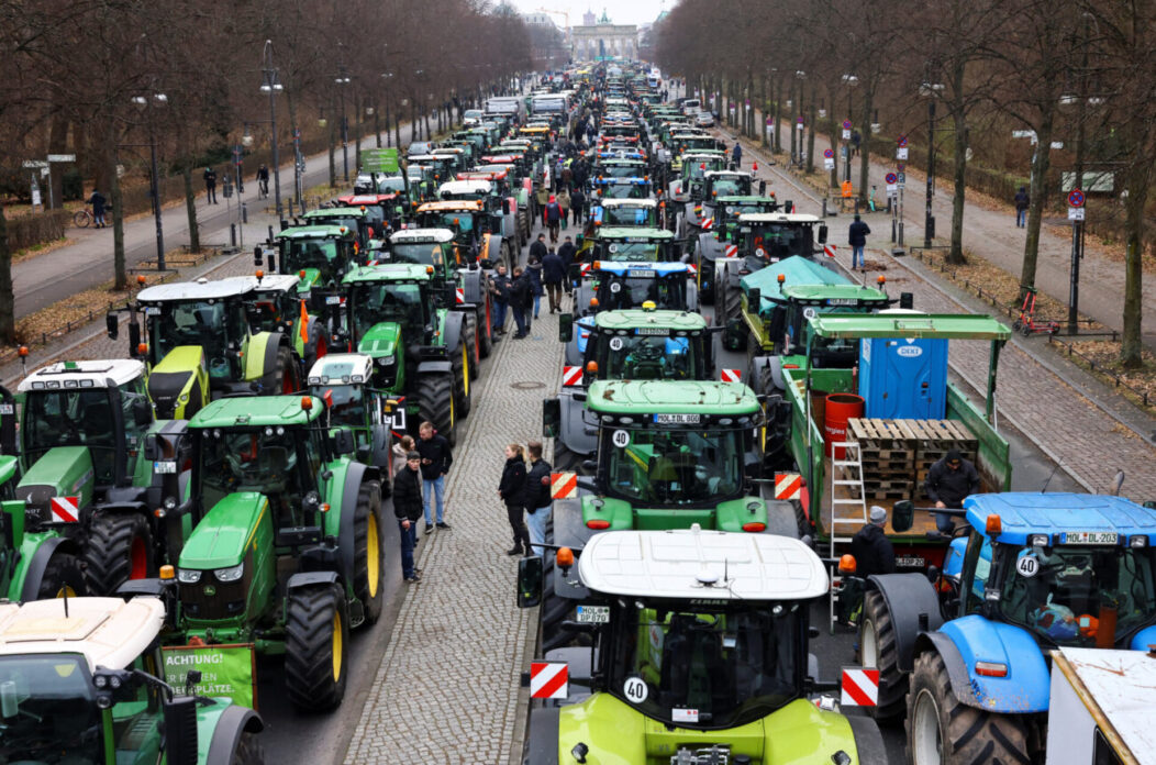 German farmers protest with tractors against the planned cut of vehicle tax subsidies in Berlin German farmers protest with tractors against the planned cut of vehicle tax subsidies in Berlin