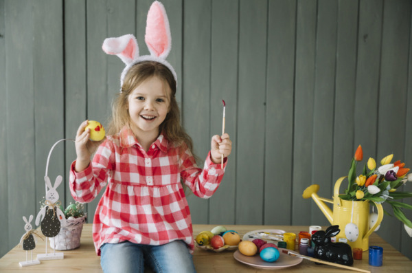 girl-bunny-ears-painting-egg-easter
