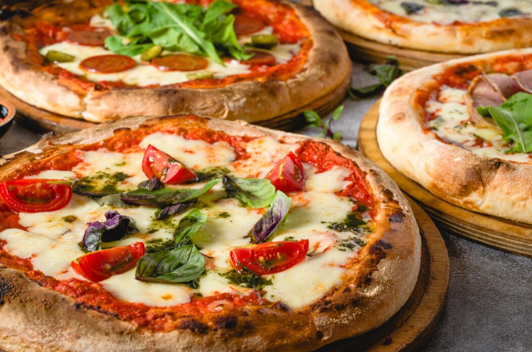 Top,View,Of,Various,Neapolitan,Pizzas,On,Grey,Stone,Table Top,View,Of,Various,Neapolitan,Pizzas,On,Grey,Stone,Table
