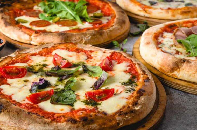 Top,View,Of,Various,Neapolitan,Pizzas,On,Grey,Stone,Table Top,View,Of,Various,Neapolitan,Pizzas,On,Grey,Stone,Table